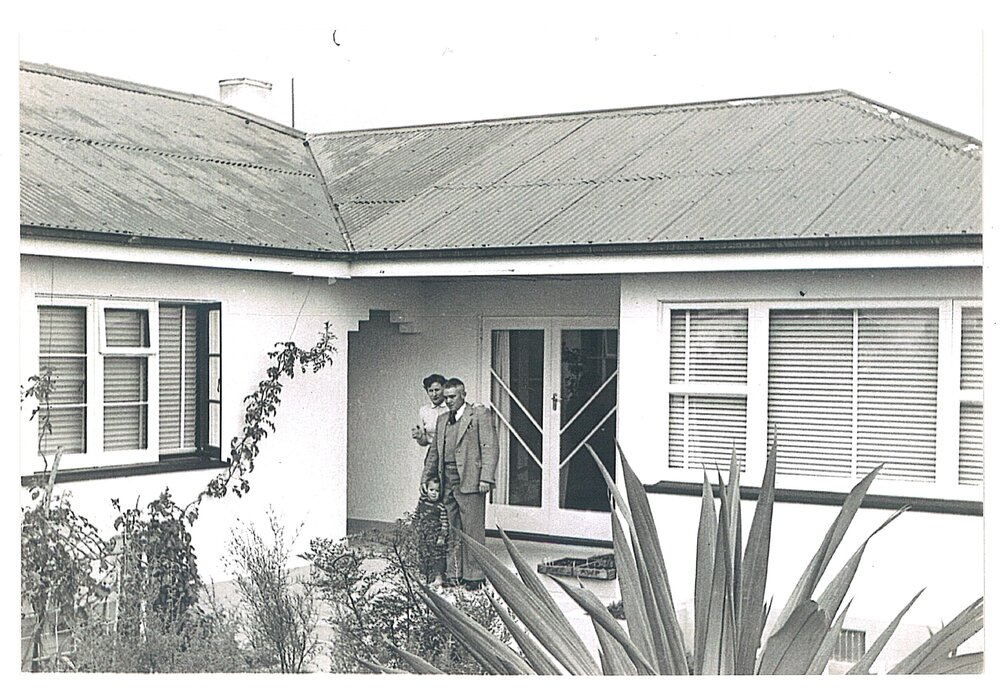 Noel and Iris outside their home in Te Puke with son Clinton