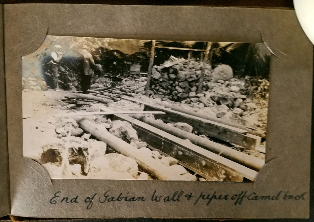 End of gabion wall &amp; pipes off camel back.