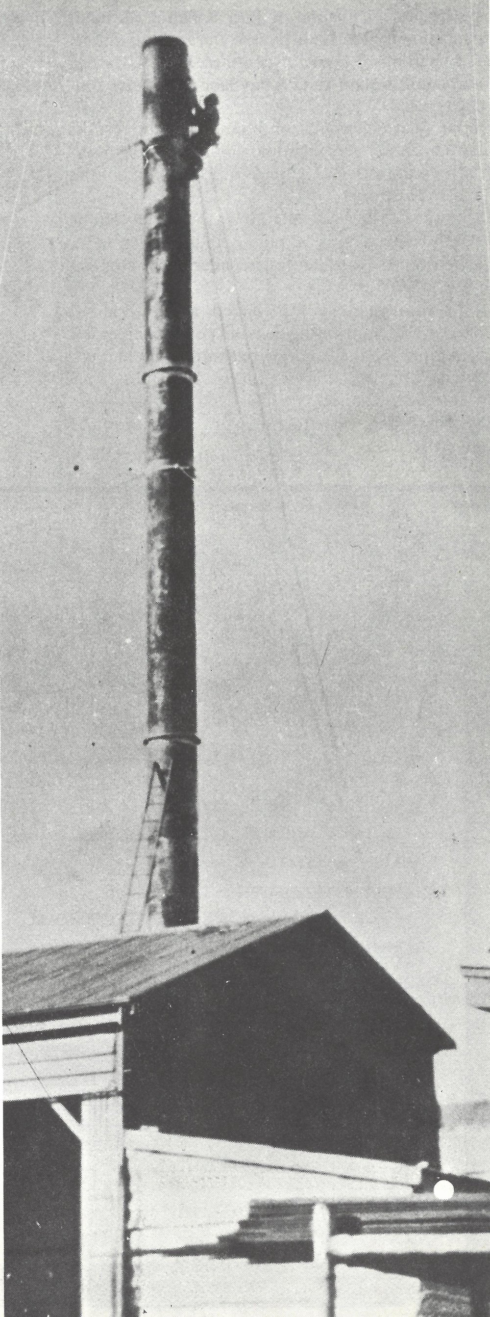Norman Kirk painting Katikati Dairy Company's chimney