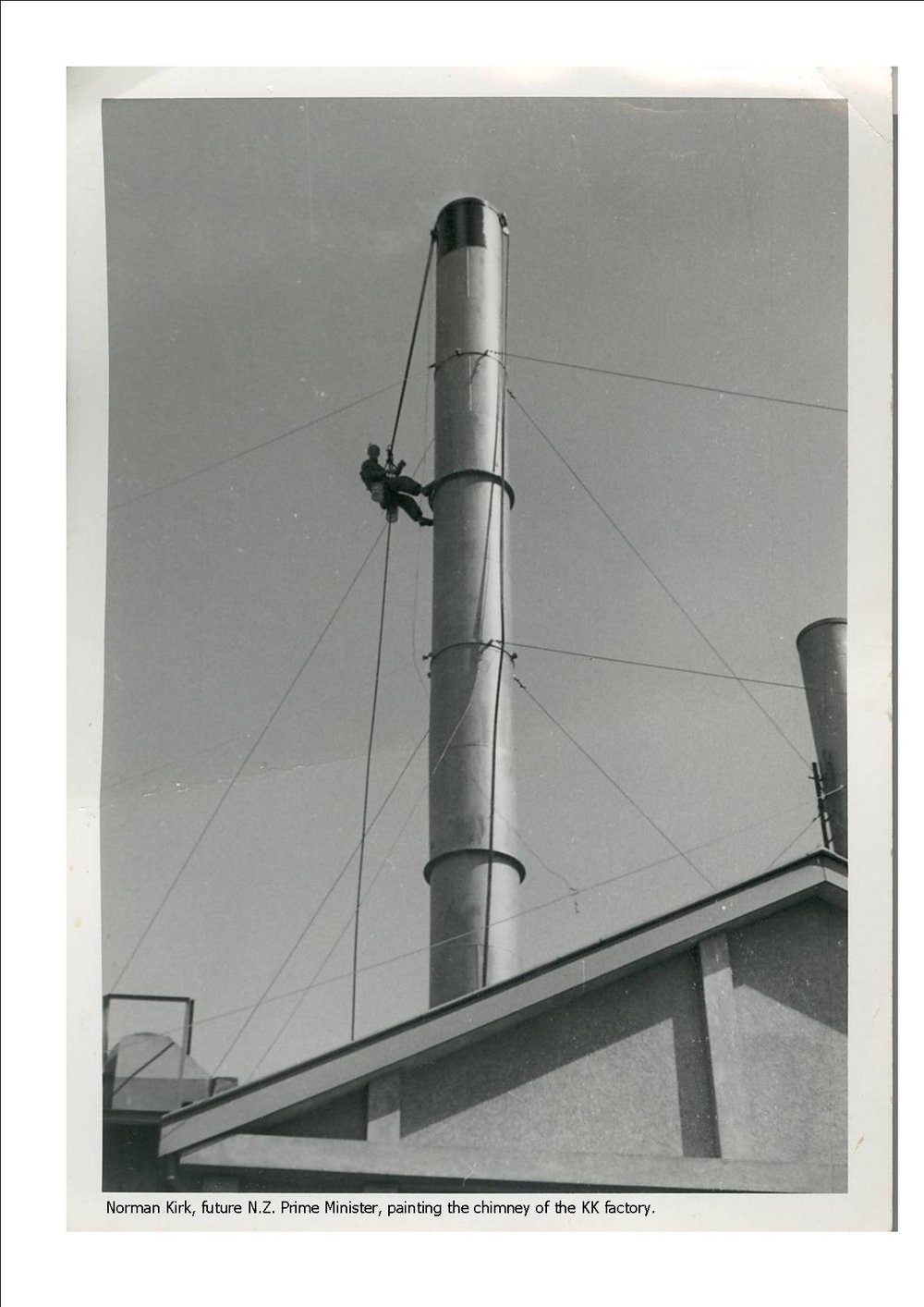 Norman Kirk painting chimney