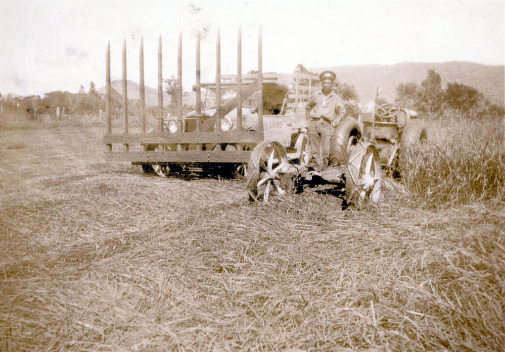 Truck fitted with buckrake for haymaking