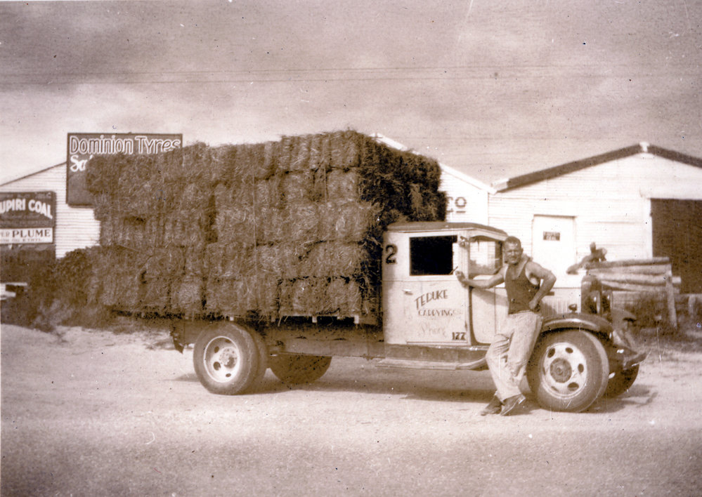 Baled hay on truck