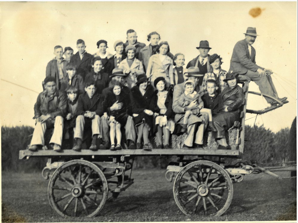 Group of hunt watchers on a wagon, 1936.