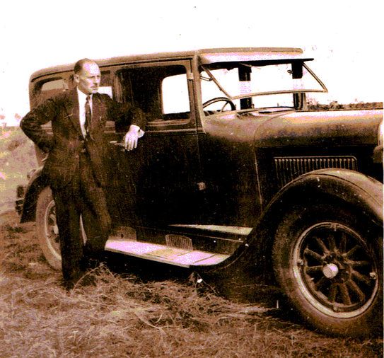 Dick Lea beside car in 1939