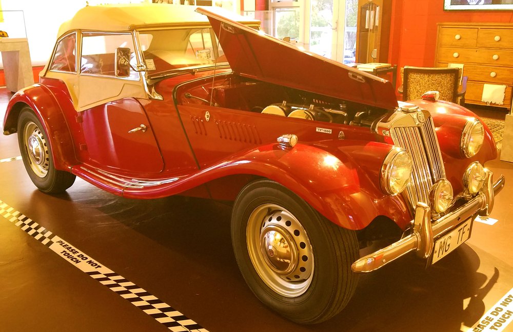 Denny Hulme's MG TF with the hood open