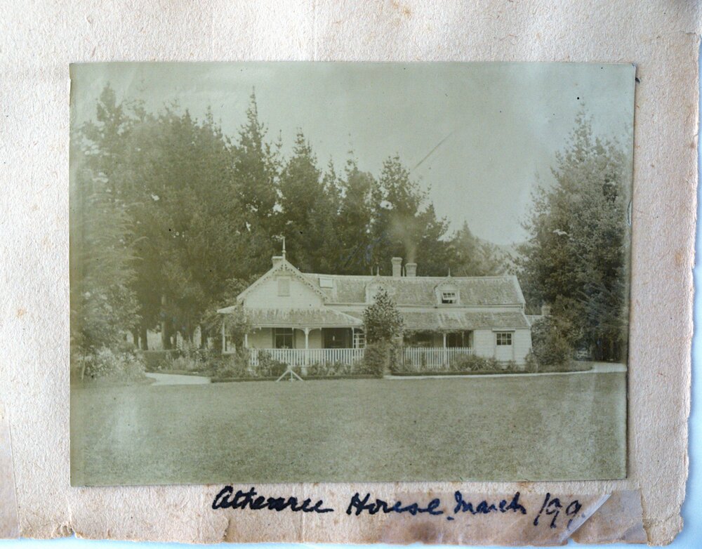 Athenree Homestead with smoke coming out of chimney