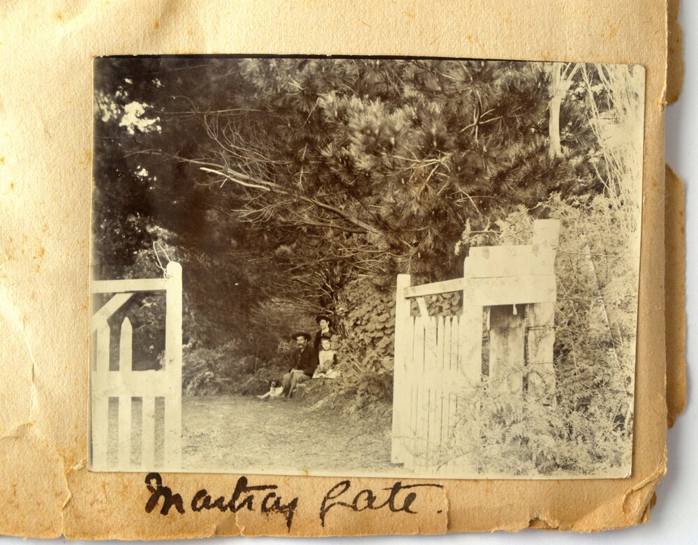 The gate into Martray House with the family and Prince the dog