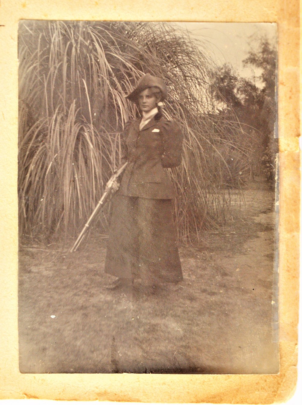 Woman holding a gun at Katikati.