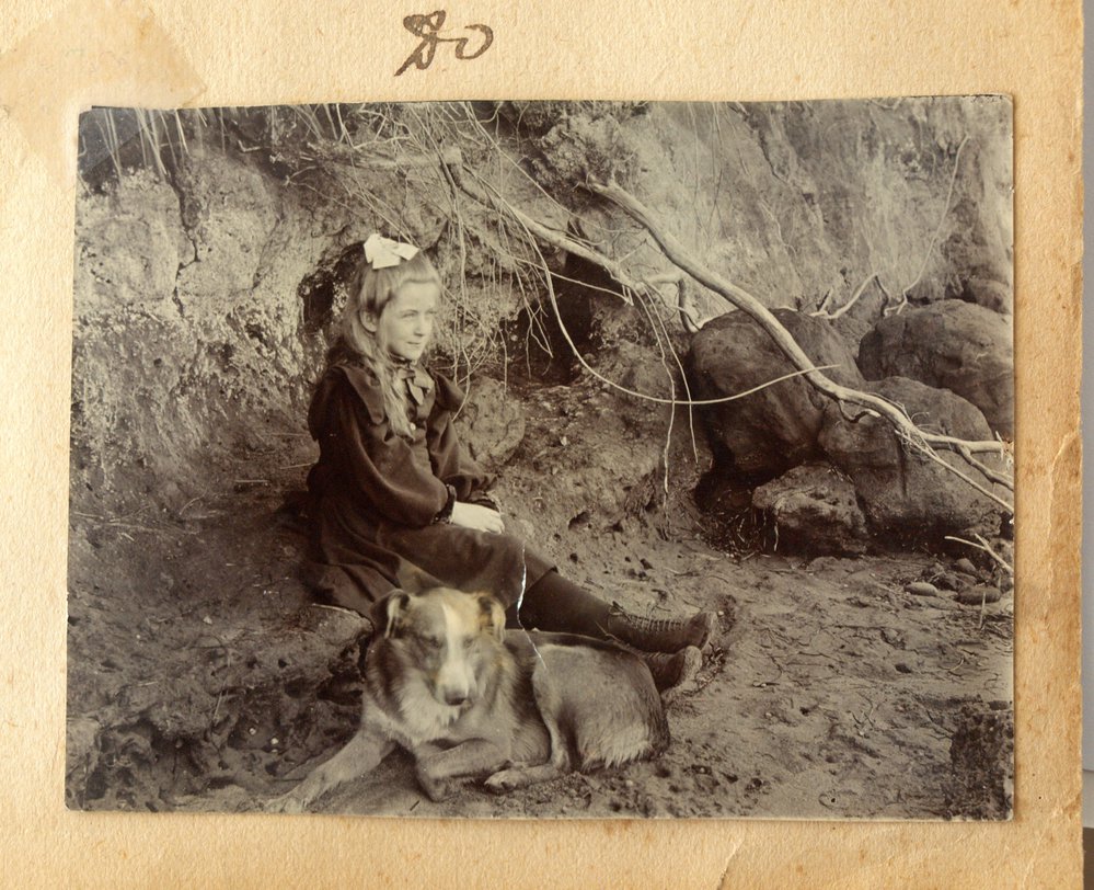 Norah Stein and dog at Katikati.