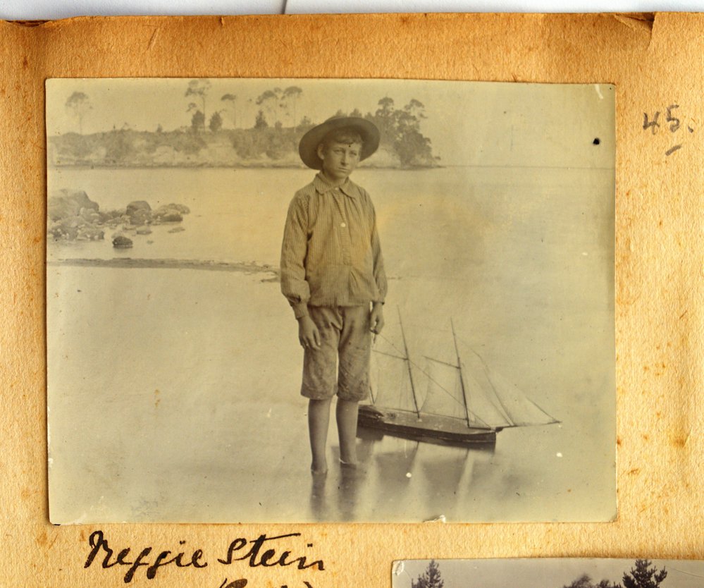 Reginald Stein with toy sailing boat.