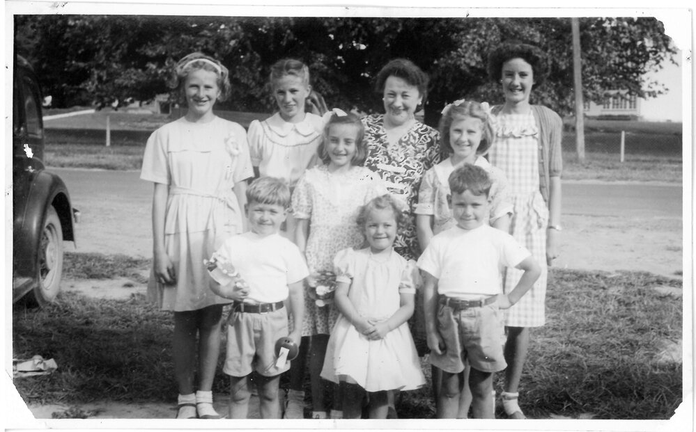 Eva Henderson with a group of children