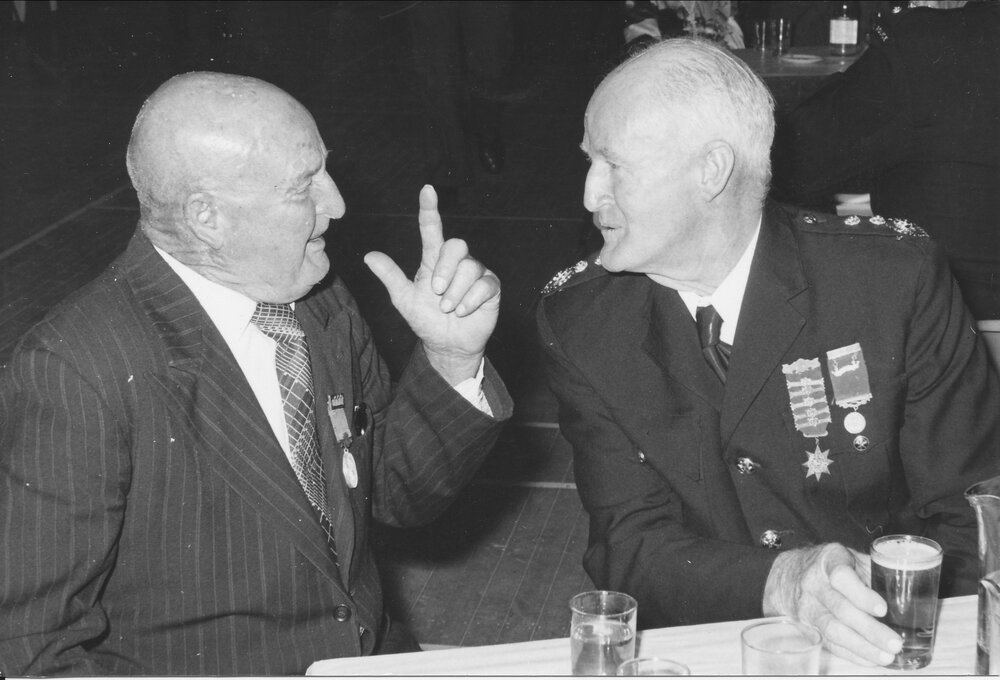 Bob Dunlop and Eric Gilmore sharing stories