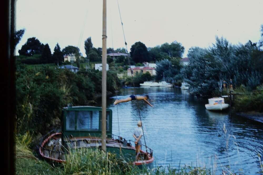 Launches and swimmers at Katikati Landing