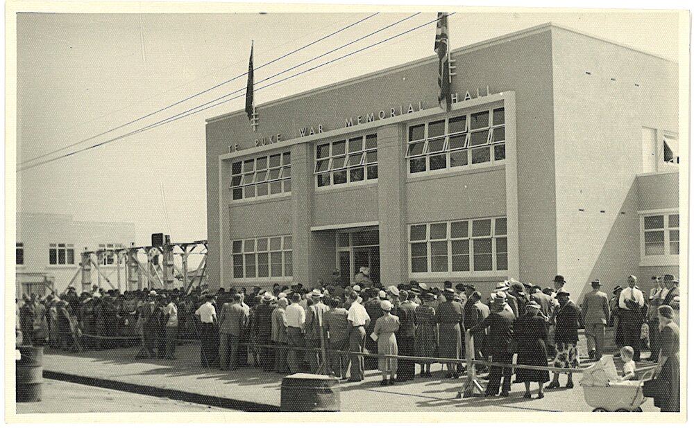 Crowd standing outside Te Puke War Memorial Hall on opening day