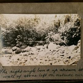 Stone wall upstream of main dam building site