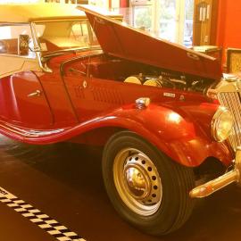 Denny Hulme's MG TF with the hood open