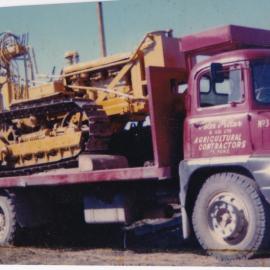 Truck and digger in use by Peter Pittar & Co. Ltd.