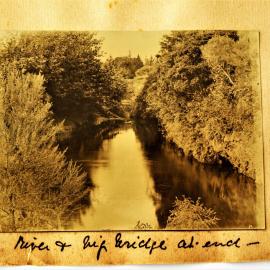 Scenic view of the Waiau River with a bridge in the distance