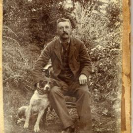 John Reynolds with his dog at Katikati.