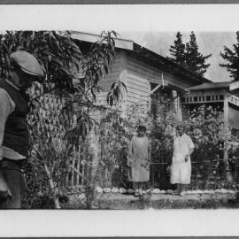 Unknown ladies admiring Mr. Hatch's garden