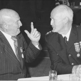 Bob Dunlop and Eric Gilmore sharing stories