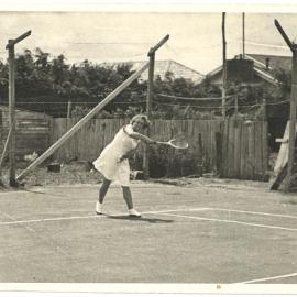 Betty Brake playing tennis in Katikati