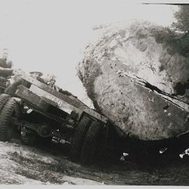 Reloading a kauri log (back of truck)