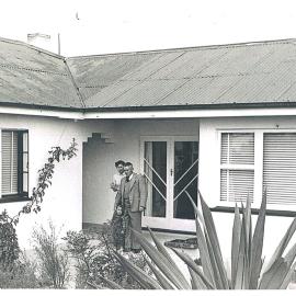 Noel and Iris outside their home in Te Puke with son Clinton