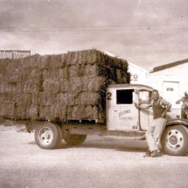 Baled hay on truck