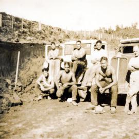 Roading workers and truck.