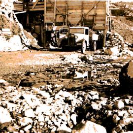 Quarry crusher and truck